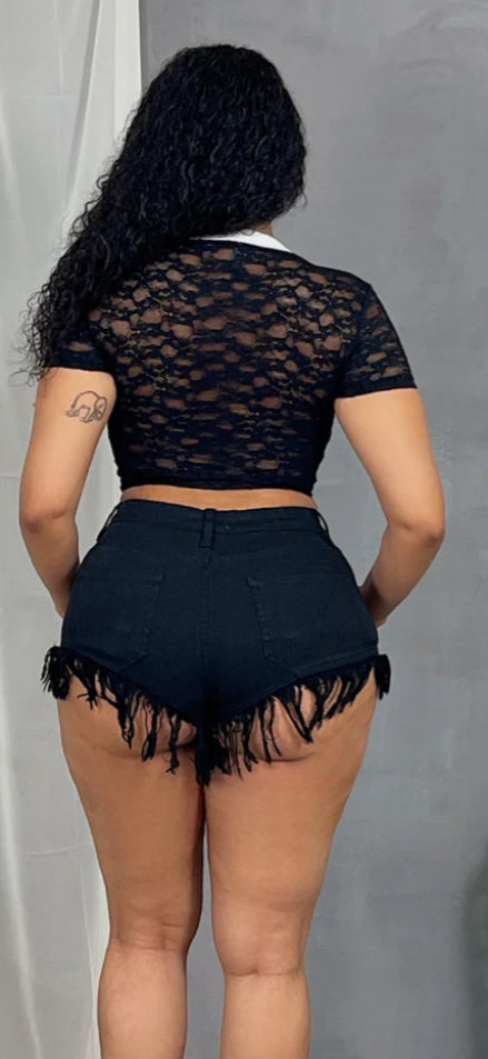 FRINGED DENIM MINI SHORTS