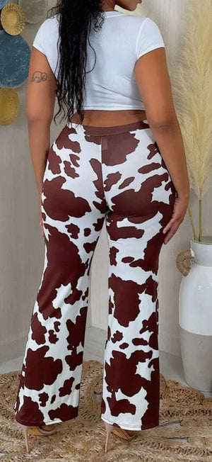 F.A.S.T Boutique COW PRINTED PANTS(pre-order)